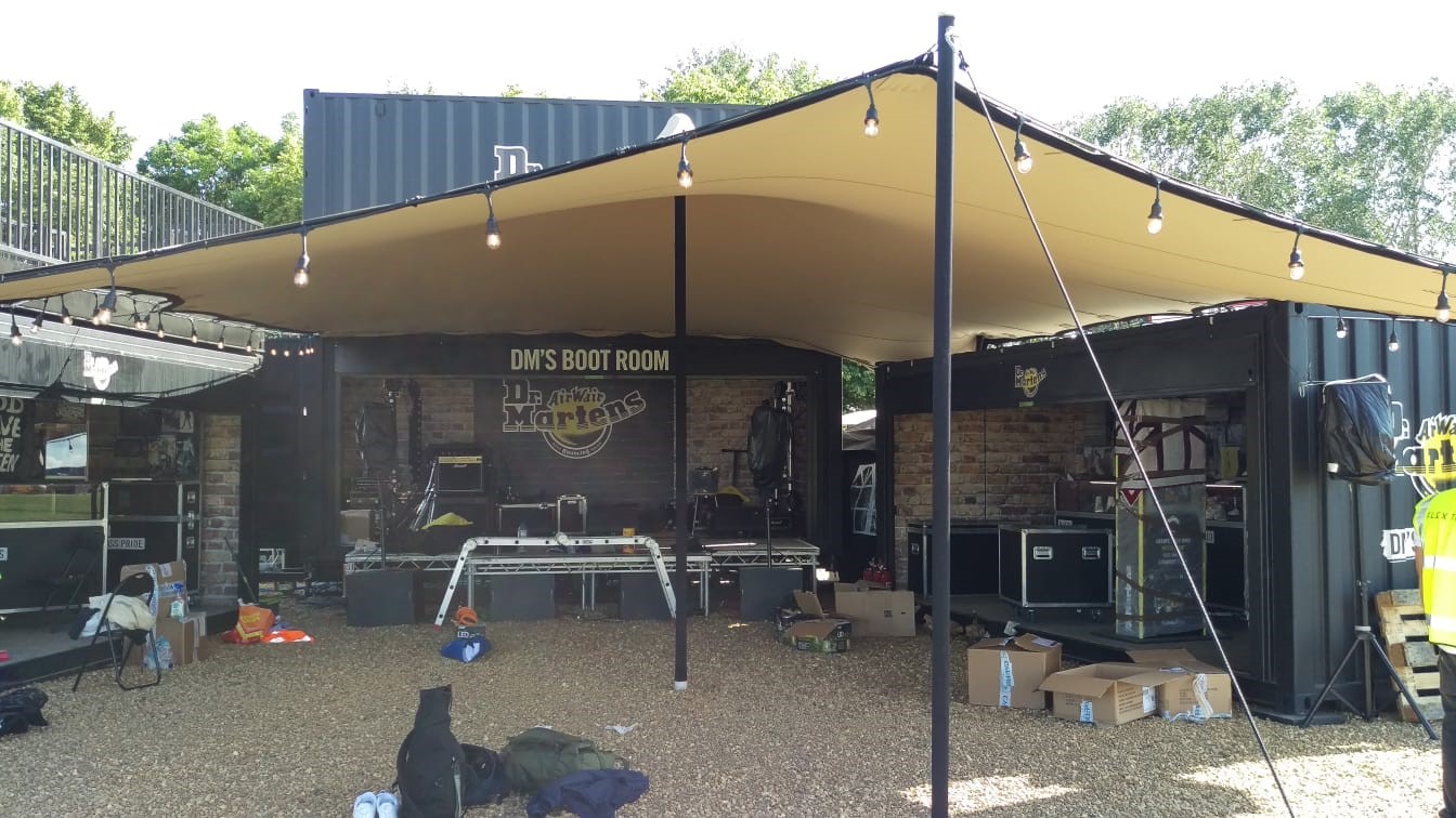 Dr Martens DM Boot Room Stage ready ahead of Field Day festival with event shipping containers and gazebo 