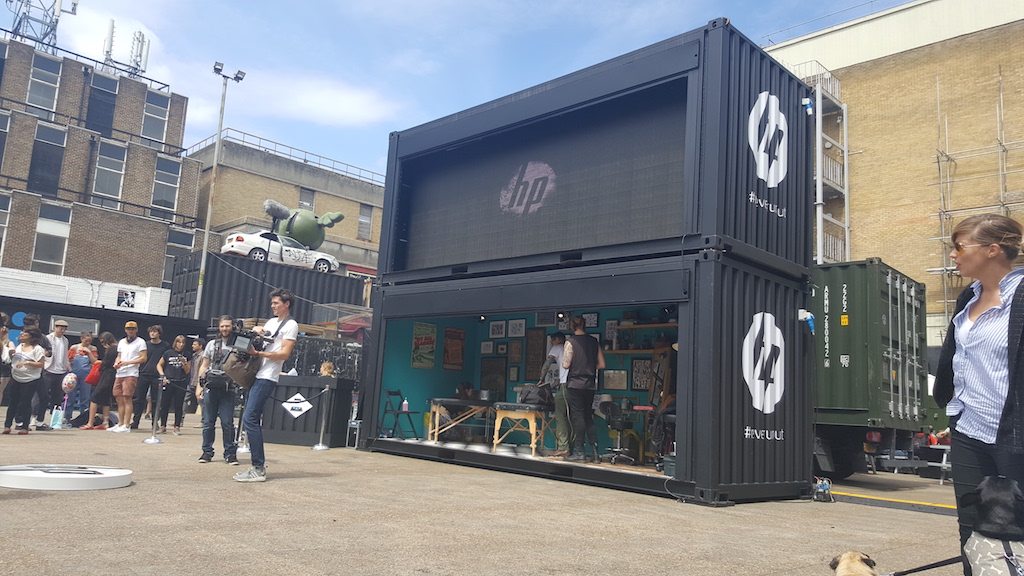 HP Printers pop-up shipping container conversion experiential pop-up tattoo studio