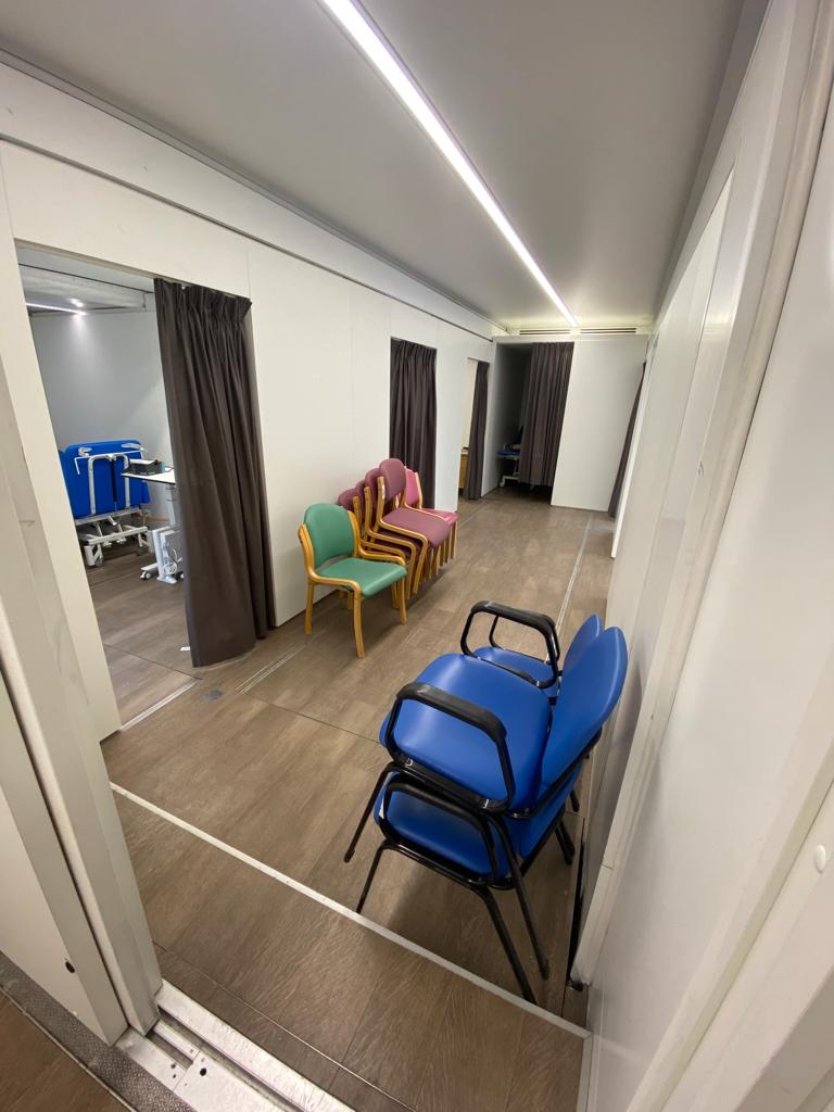Apollo roadshow truck medical unit transformed into pop-up health screening clinic for cardiac assessments for Worthing Hospital Sussex