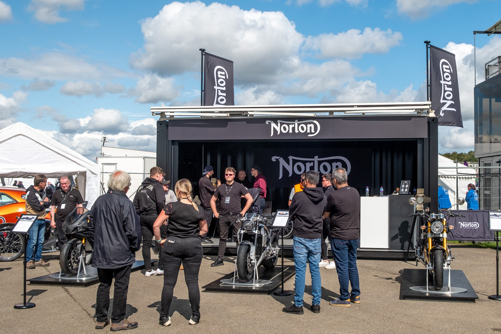 Norton Motorcycles branded shipping container conversion festival activation at Silverstone with motorbike display and point of sales