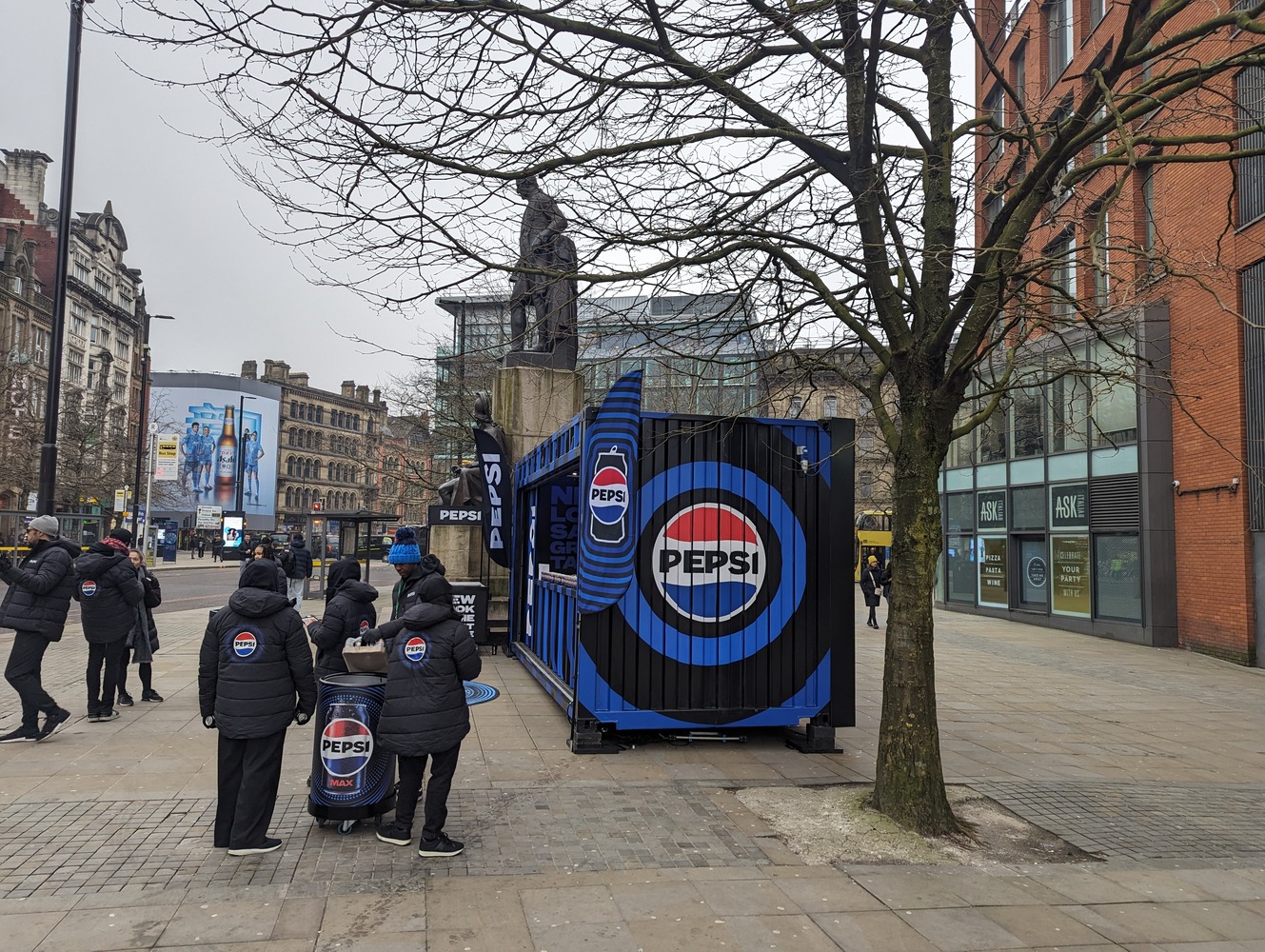 Pepsi branded shipping container conversion using The Event Structure Gallery Plus customised container for product sampling campaign on a busy highstreet, handing cans of pop to passersby in Manchester