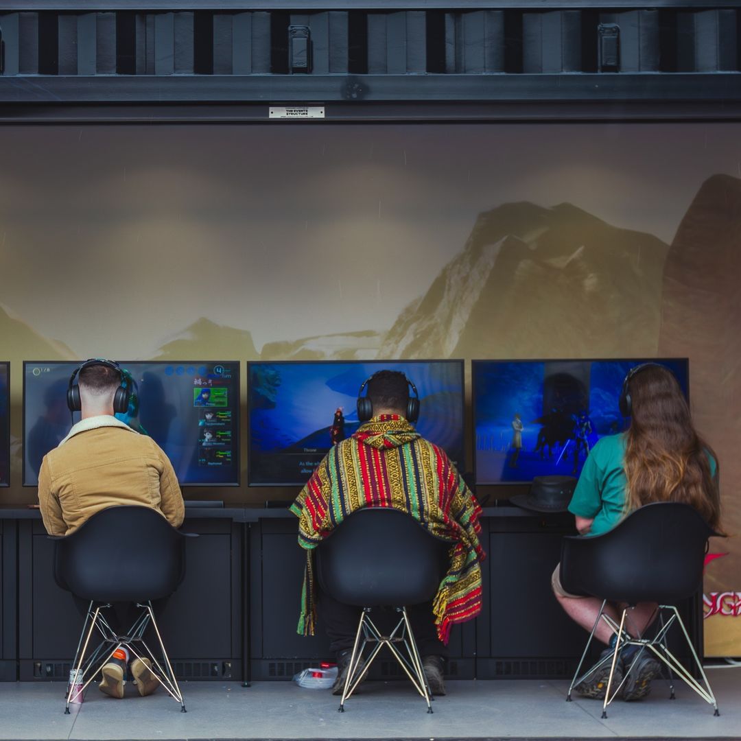 The Event Structure Statement shipping container product branded and vinyl wrapped with game branding for SEGA with three gaming stations for Download Fest