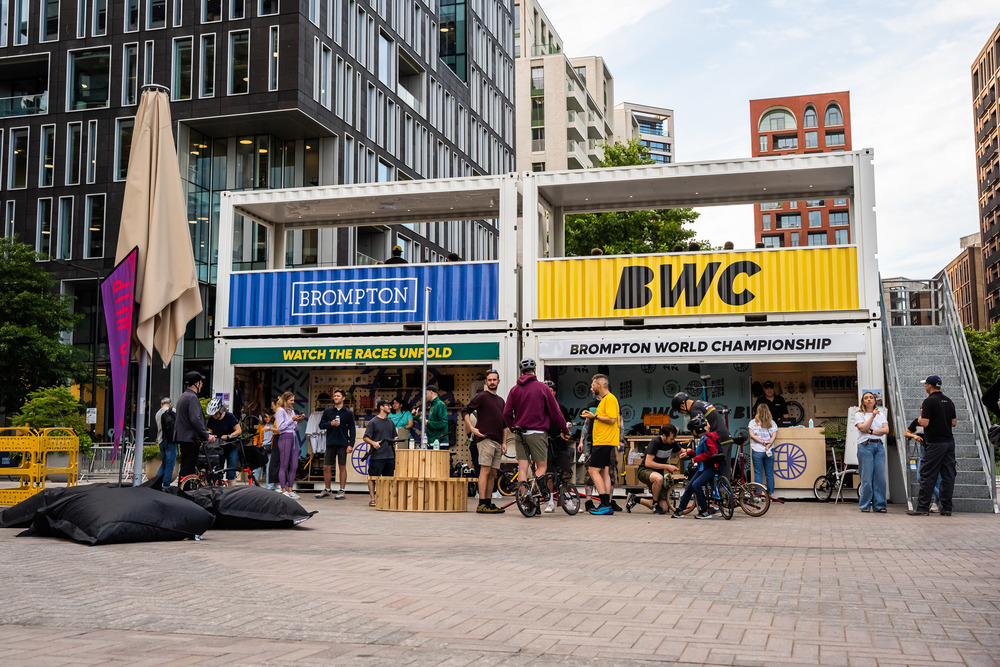 Brompton Bicycle world championships brand activation using multiple Impact Premium shipping container conversions with enclosed multi-deck viewing area