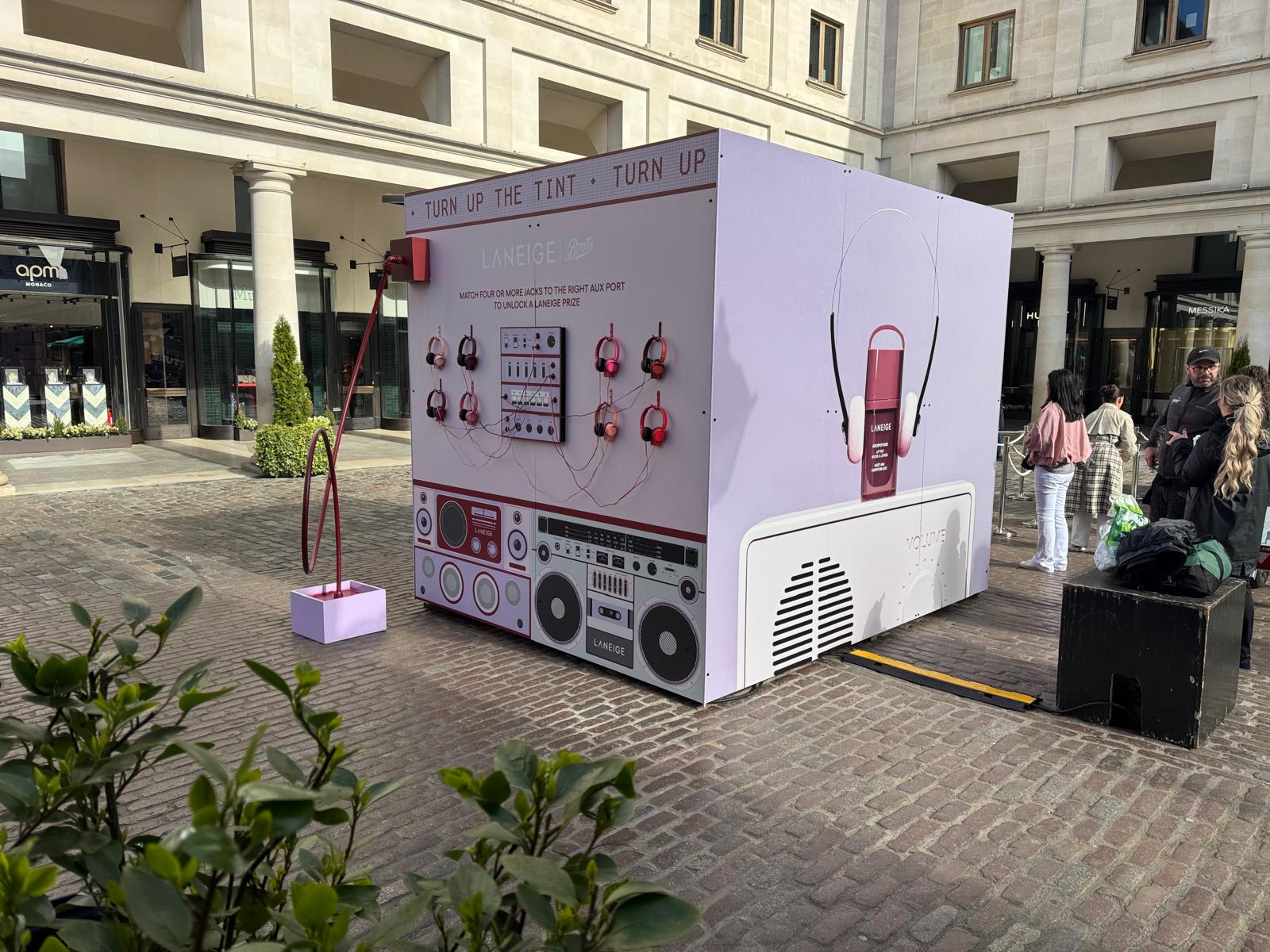 Back view of the Laneige Boutique shipping container at Covent Garden, highlighting the compact design and logistical access. 
