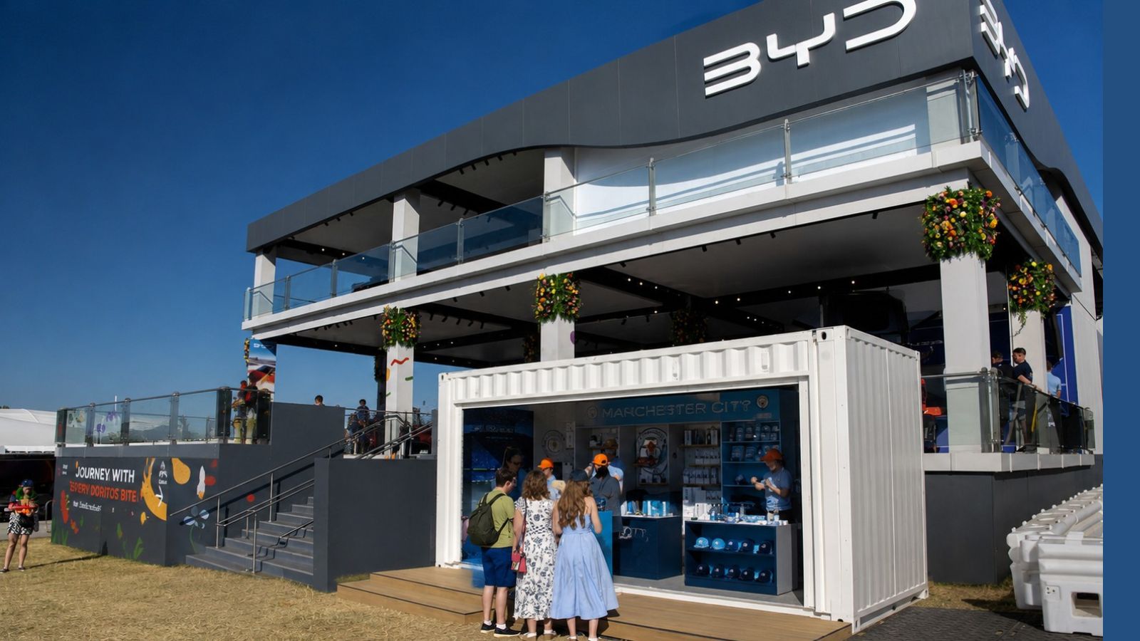 BYD activation at Goodwood Festival of Speed celebrating its partnership with Manchester City Football Club.