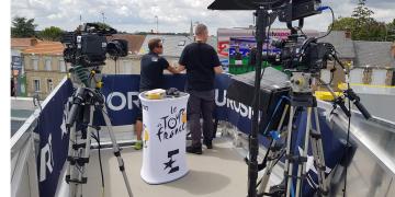 Filming on Mobile studio roadshow truck and exhibition trailer at sporting event