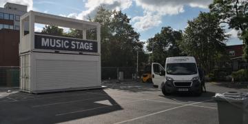 Impact event shipping container used as music stage at 2019 Vitality Blast 