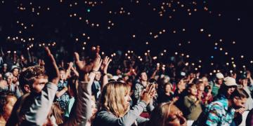 Audience clapping and cheering at a standout seasonal event