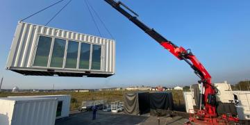 Custom-build shipping container design showroom for global brand