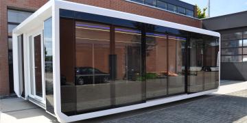 Expandable Panoramic mobile showroom with striking glass profile exhibition unit on-site