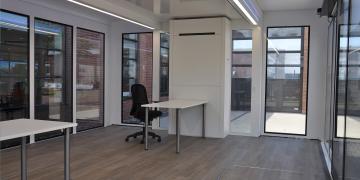 Mobile showroom Expandable Panoramic inside exhibition unit interior with striking glass portfolio 