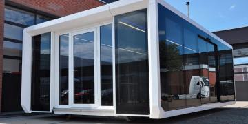 Expandable Panoramic mobile showroom with striking glass profile exhibition unit set-up and on location