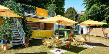 Everleaf pub in the park shipping container bar with upper deck terrace customised container