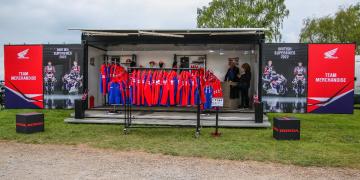 shipping container conversion pop-up shop retail outlet for the honda racing team at british superbike championship