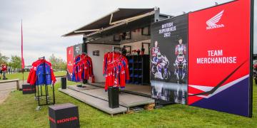 shipping container conversion pop-up shop retail outlet for the honda racing team at british superbike championship