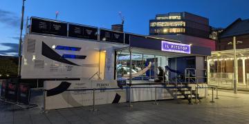 momentum roadshow trailer truck on roadshow event  Peroni Nastro Azzurro 0.0% as part of their ongoing partnership with Aston Martin Aramco Cognizant Formula One™ Team, bringing racing fans a multi-sensory experience called 'Il Pitstop'