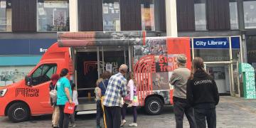 StoryTrails promotional vehicle immersive UK tour vehicle branded on location and attracting crowds, using The Events Structure self-drive Ranger vehicle