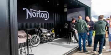 Norton Motorcycles branded experiential marketing shipping container conversion at Silverstone Festival featuring motorbikes display and sales outlet