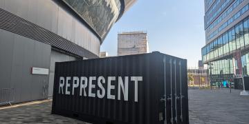 Represent Clothing branded pop-up retail unit shipping container conversion using The Event Structure Studio Premium customised container with cargo doors