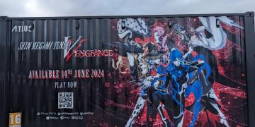 Branded shipping container activation vinyl wrapped with Shin Megami Tensei Vengeance gaming advertisement and housing three playstation console stations for festival goers at Download Fest to enjoy