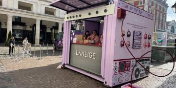 Side view of the 10ft Boutique shipping container used for Laneige activation at Covent Garden, showing branding and setup. 