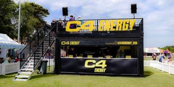 20ft container bar with open upper deck at outdoor event for NutraBolt activation