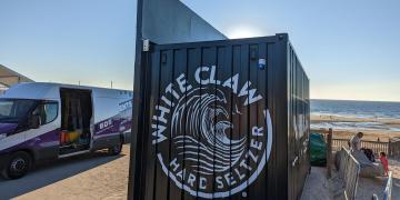 branded container bar hire with large scale graphics for product promotion event