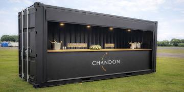container bar hire with branded setup for champagne event and drinks service
