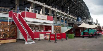 container bar hire at rugby stadium event with branded Fampus Grouse drinks bar 