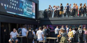 container bar with upper deck used for brand activation and guest engagement at event