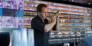 drinks sampling bar setup inside container with branded serving area for event activation